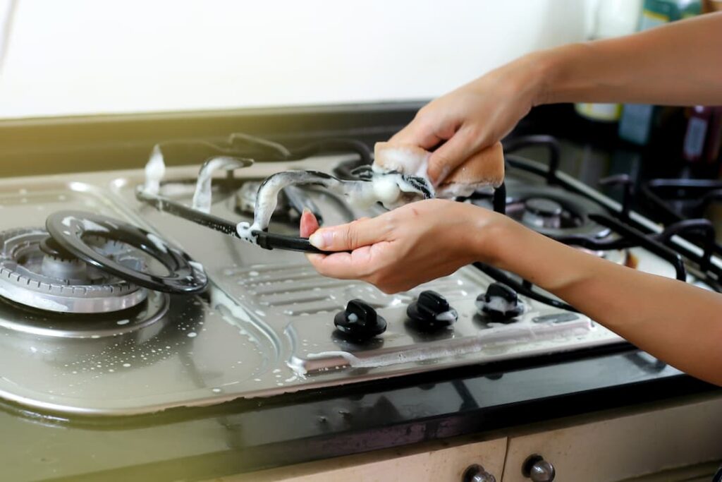 Cleaning a dirty gas stove